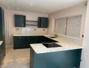outbuilding conversion kitchen shower room croydon